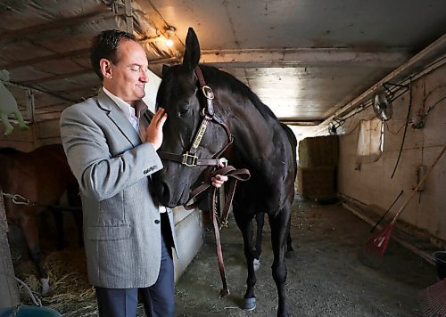 RUTH BONNEVILLE / WINNIPEG FREE PRESS


SPORTS - Assiniboia Downs Manitoba bred horse -  Purrsistent


Portrait of ASD CEO, Darren Dunn, with Manitoba bred horse, Purrsistent (this is the correct spelling), next to her stall in the Assiniboia Downs backstretch stables on Friday. 

For story on  big wagering day on Monday for Manitoba.

See story by George Williams 


July 3rd,  2020