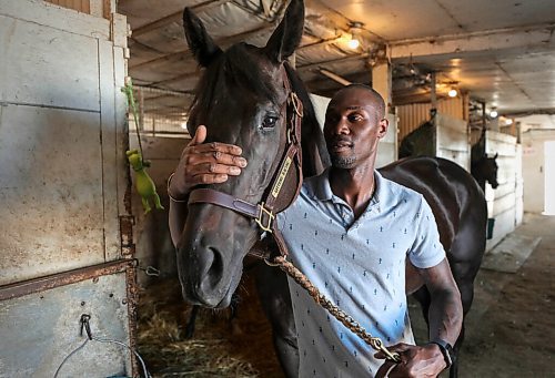RUTH BONNEVILLE / WINNIPEG FREE PRESS


SPORTS - Assiniboia Downs Manitoba bred horse -  Purrsistent  with trainer.  


Portrait of ASD horse trainer, Devon Gittens with Manitoba bred horse, Purrsistent (this is the correct spelling), outside her stall in the Assiniboia Downs backstretch stables on Friday. 

For story on  big wagering day on Monday for Manitoba.

See story by George Williams 


July 3rd,  2020