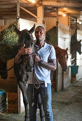 RUTH BONNEVILLE / WINNIPEG FREE PRESS


SPORTS - Assiniboia Downs Manitoba bred horse -  Purrsistent  with trainer.  


Portrait of ASD horse trainer, Devon Gittens with Manitoba bred horse, Purrsistent (this is the correct spelling), outside her stall in the Assiniboia Downs backstretch stables on Friday. 

For story on  big wagering day on Monday for Manitoba.

See story by George Williams 


July 3rd,  2020