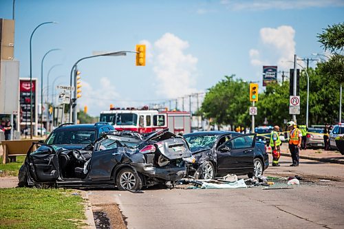 MIKAELA MACKENZIE / WINNIPEG FREE PRESS

Police respond to a multiple vehicle collision on Portage Avenue at Saint Charles Street in Winnipeg on Friday, July 3, 2020. 
Winnipeg Free Press 2020.