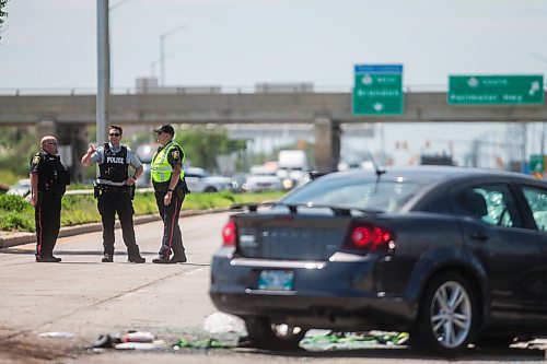 MIKAELA MACKENZIE / WINNIPEG FREE PRESS

Police respond to a multiple vehicle collision on Portage Avenue at Saint Charles Street in Winnipeg on Friday, July 3, 2020. 
Winnipeg Free Press 2020.