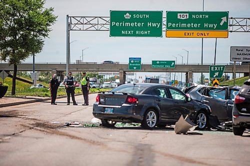 MIKAELA MACKENZIE / WINNIPEG FREE PRESS

Police respond to a multiple vehicle collision on Portage Avenue at Saint Charles Street in Winnipeg on Friday, July 3, 2020. 
Winnipeg Free Press 2020.