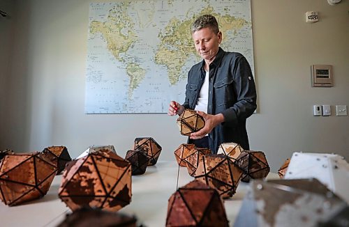 RUTH BONNEVILLE / WINNIPEG FREE PRESS


INTERSECTION - 20-sided Icosahedrons. 

Portraits of  Artist  Ande Brown, with her  20-sided Icosahedron globes in her home/studio.  Ande is holding one of her globes made of leather.  


What: This is for an Intersection piece on Ande's unique & super eye-catching globes (see at icoglobes.com)

Story about how  Ande, a world traveler, came up with the idea of globes in the shape of 20-sided Icosahedrons. She makes them out of a variety of materials and each one is unique.


This is for the July 11 Intersection page.

Dave Sanderson story. 

July 3rd,  2020