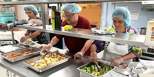 Canstar Community News Volunteers prepare meals for the Transcona Council of Seniors' meal program,k which is now offering takeout and pickup service.