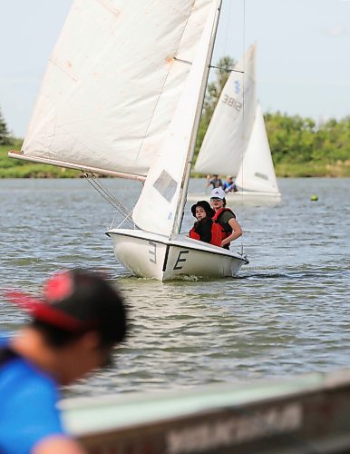 RUTH BONNEVILLE / WINNIPEG FREE PRESS

Local - Sailing Standup at FortWhyte Alive

Natalie Cuvelier (white hat), learns to sail with her friend, Reese Campbell (black hat) with Sail Manitoba at FortWhyte Alive on Monday. 
 
Monday was the first of their week long (morning only) intro CANSail Lessons for Sailors 15+ through CanSail MB.  See Sail Manitoba website for more details.  

July 6th,  2020