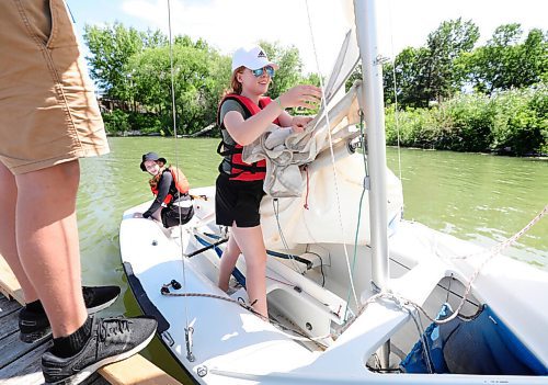 RUTH BONNEVILLE / WINNIPEG FREE PRESS

Local - Sailing Standup at FortWhyte Alive

Natalie Cuvelier (white hat), learns to sail with her friend, Reese Campbell (black hat) with Sail Manitoba at FortWhyte Alive on Monday. 
 
Monday was the first of their week long (morning only) intro CANSail Lessons for Sailors 15+ through CanSail MB.  See Sail Manitoba website for more details.  

July 6th,  2020