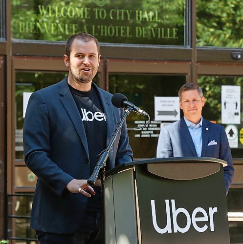 MIKE DEAL / WINNIPEG FREE PRESS
Winnipeg Mayor Brian Bowman arrived via Uber driven by Michael van Hemman, Head of City Operations for Uber in Canada for the announcement that the ride sharing service is open for business in Winnipeg as of today. 
200707 - Tuesday, July 7, 2020.