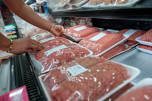 JESSE BOILY  / WINNIPEG FREE PRESS
Billy Zeid arranges ground beef at his dads Foodfare grocery store on Tuesday. According to StatsCanada beef prices are increasing across Manitoba and the country. Tuesday, July 7, 2020.
Reporter: Temur Durrani