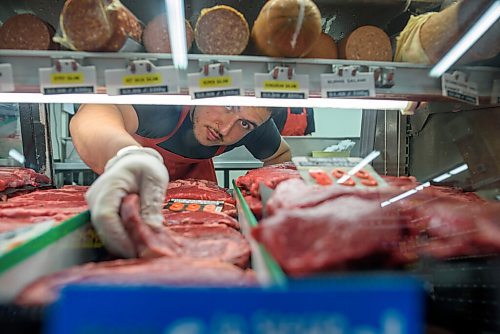 JESSE BOILY  / WINNIPEG FREE PRESS
Billy Zeid picks a steak at his dads Foodfare grocery store on Tuesday. According to StatsCanada beef prices are increasing across Manitoba and the country. Tuesday, July 7, 2020.
Reporter: Temur Durrani