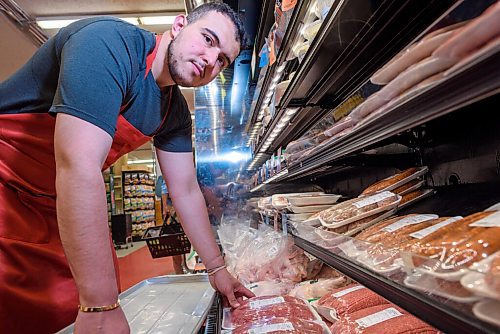 JESSE BOILY  / WINNIPEG FREE PRESS
Billy Zeid arranges ground beef at his dads Foodfare grocery store on Tuesday. According to StatsCanada beef prices are increasing across Manitoba and the country. Tuesday, July 7, 2020.
Reporter: Temur Durrani