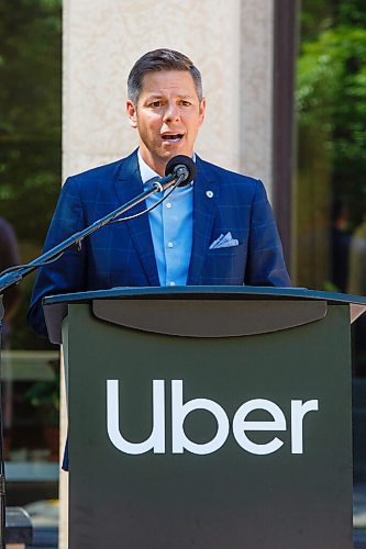 MIKE DEAL / WINNIPEG FREE PRESS
Winnipeg Mayor Brian Bowman arrives at City Hall via an Uber driven by Michael van Hemman, Head of City Operations for Uber in Canada for the announcement that the ride sharing service is open for business in Winnipeg as of today. 
200707 - Tuesday, July 07, 2020.