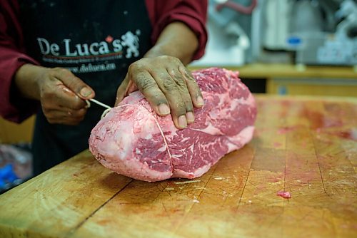 JESSE BOILY  / WINNIPEG FREE PRESS
Yonas Beka, a butcher at De Lucas Speciality store, prepares meat for sale on Tuesday. According to StatsCanada beef prices are increasing across Manitoba and the country. Tuesday, July 7, 2020.
Reporter: Temur Durrani