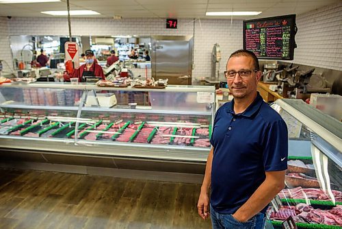 JESSE BOILY  / WINNIPEG FREE PRESS
Vince De Luca, manager at De Lucas Speciality store, at the store meat department on Tuesday. According to StatsCanada beef prices are increasing across Manitoba and the country. Tuesday, July 7, 2020.
Reporter: Temur Durrani