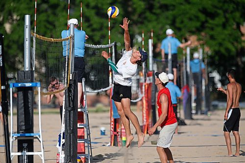 JOHN WOODS / WINNIPEG FREE PRESS
Former Manitoba Bison Dustin Spiring (red) and his teammate Zack Jansen (white) play beach volleyball on opening day of the adult league at Cindy Klassen Rec Centre in Winnipeg, Tuesday, July 7, 2020.

Reporter: Allen