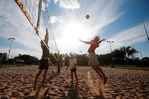 JOHN WOODS / WINNIPEG FREE PRESS
Former Manitoba Bison Dustin Spiring (red) and his teammate Zack Jansen (white) play beach volleyball on opening day of the adult league at Cindy Klassen Rec Centre in Winnipeg, Tuesday, July 7, 2020.

Reporter: Allen