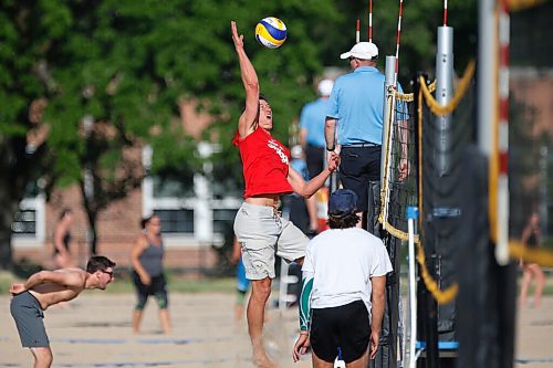 JOHN WOODS / WINNIPEG FREE PRESS
Former Manitoba Bison Dustin Spiring (red) and his teammate Zack Jansen (white) play beach volleyball on opening day of the adult league at Cindy Klassen Rec Centre in Winnipeg, Tuesday, July 7, 2020.

Reporter: Allen