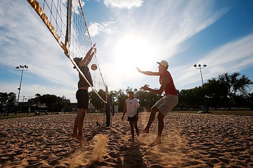 JOHN WOODS / WINNIPEG FREE PRESS
Former Manitoba Bison Dustin Spiring (red) and his teammate Zack Jansen (white) play beach volleyball on opening day of the adult league at Cindy Klassen Rec Centre in Winnipeg, Tuesday, July 7, 2020.

Reporter: Allen