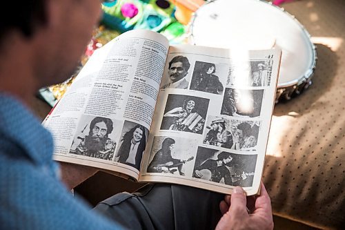 MIKAELA MACKENZIE / WINNIPEG FREE PRESS

Leonard Podolak, son of Folk Fest founder Mitch Podolak, poses for a portrait with a 1983 program in his house in Winnipeg on Wednesday, July 8, 2020. For Al Small story.
Winnipeg Free Press 2020.