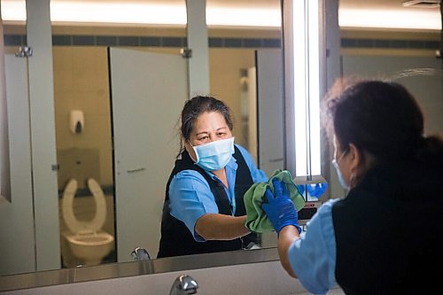 MIKAELA MACKENZIE / WINNIPEG FREE PRESS

Cynthia Cleodora wipes down high-touch areas in the washroom at the Winnipeg James Armstrong Richardson International Airport in Winnipeg on Wednesday, July 8, 2020. For Ben Waldman story.
Winnipeg Free Press 2020.