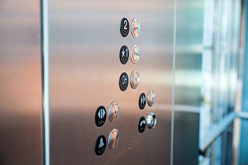 MIKAELA MACKENZIE / WINNIPEG FREE PRESS

Elevator buttons, which are considered high-touch areas and are given more cleaning efforts, at the Winnipeg James Armstrong Richardson International Airport in Winnipeg on Wednesday, July 8, 2020. For Ben Waldman story.
Winnipeg Free Press 2020.