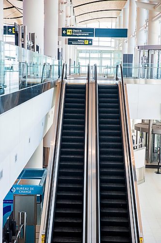 MIKAELA MACKENZIE / WINNIPEG FREE PRESS

Escalator handrails, which are considered high-touch areas and are given more cleaning efforts, at the Winnipeg James Armstrong Richardson International Airport in Winnipeg on Wednesday, July 8, 2020. For Ben Waldman story.
Winnipeg Free Press 2020.