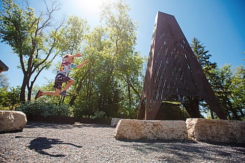 MIKE DEAL / WINNIPEG FREE PRESS
The Ecobuage sculpture, beside the duck pond at St. Vital Park doubles as a chimney for a fire pit.
Leif Timmerman, 8, who belongs to a parkour gym, uses the limestones benches around the art installation to practice.
See Brenda Suderman Sunday special 
200708 - Wednesday, July 08, 2020.