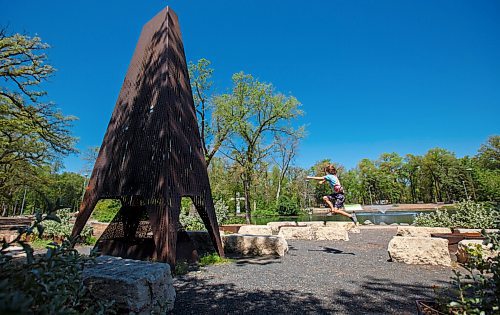 MIKE DEAL / WINNIPEG FREE PRESS
The Ecobuage sculpture, beside the duck pond at St. Vital Park doubles as a chimney for a fire pit.
Leif Timmerman, 8, who belongs to a parkour gym, uses the limestones benches around the art installation to practice.
See Brenda Suderman Sunday special 
200708 - Wednesday, July 08, 2020.