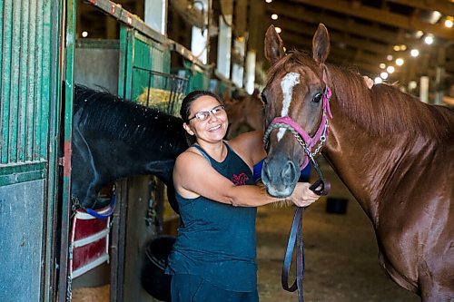 MIKAELA MACKENZIE / WINNIPEG FREE PRESS

Jennifer Tourangeau poses for a portrait with double stakes winner Deep Explorer at the Assiniboia Downs in Winnipeg on Friday, July 10, 2020. For George Williams story.
Winnipeg Free Press 2020.