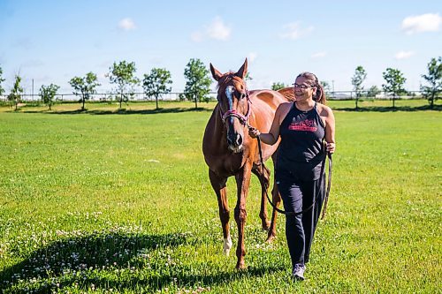 MIKAELA MACKENZIE / WINNIPEG FREE PRESS

Jennifer Tourangeau poses for a portrait with double stakes winner Deep Explorer at the Assiniboia Downs in Winnipeg on Friday, July 10, 2020. For George Williams story.
Winnipeg Free Press 2020.