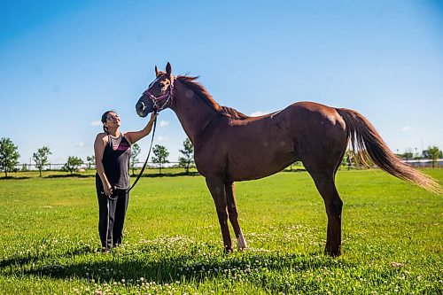 MIKAELA MACKENZIE / WINNIPEG FREE PRESS

Jennifer Tourangeau poses for a portrait with double stakes winner Deep Explorer at the Assiniboia Downs in Winnipeg on Friday, July 10, 2020. For George Williams story.
Winnipeg Free Press 2020.