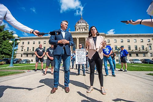 MIKAELA MACKENZIE / WINNIPEG FREE PRESS

James Bezan, Conservative member of parliament for Selkirk-Interlake-Eastman (left) and Niki Ashton, NDP member of parliament for Churchill-Keewatinook Aski speak to the media about the lack of support from the federal government for Manitobas commercial fishers with commercial fishers and community representatives standing behind at the Manitoba Legislative Building in Winnipeg on Friday, July 10, 2020. For Dillon/Gabrielle? story.
Winnipeg Free Press 2020.