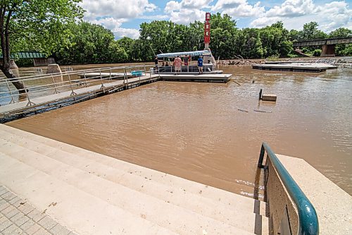 Mike Sudoma / Winnipeg Free Press
River water floods the staircases leading down to the river walk at the forks Friday afternoon
July 10, 2020