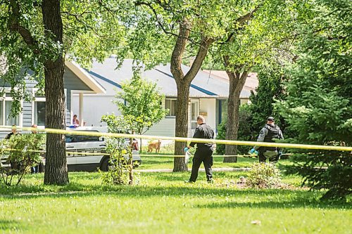 Mike Sudoma / Winnipeg Free Press
Winnipeg Police Services Tactical Team make their way through Montrose Park Saturday afternoon after bagging an item after checking on a mysterious package that appeared in the park Saturday morning
July 11, 2020