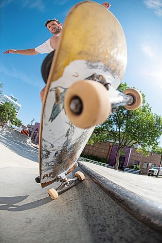 Mike Sudoma / Winnipeg Free Press
Scott Cameron gets a few tricks in as he skates West Broadway skatepark Saturday morning
July 11, 2020