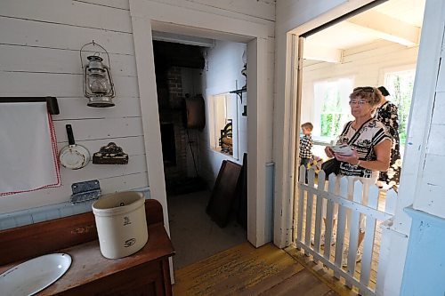 SHANNON VANRAES / WINNIPEG FREE PRESS
Liz Klassen remenices about growing up on a farm in Southern Manitoba while touring the Mennonite Heritage Village in Steinbach on July 12, 2020.