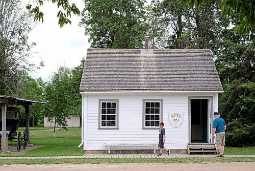 SHANNON VANRAES / WINNIPEG FREE PRESS
Jim Nicol and his grandson, Jordan Fries, check out the  Mennonite Heritage Village in Steinbach on July 12, 2020.