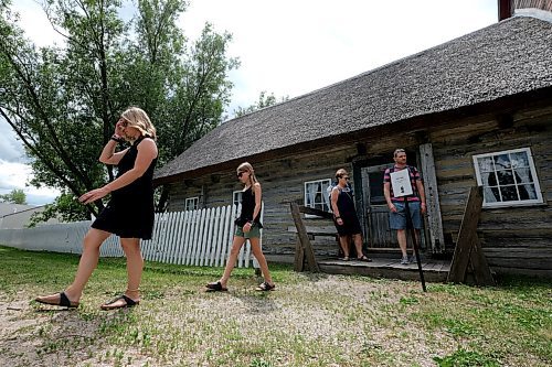 SHANNON VANRAES / WINNIPEG FREE PRESS
Tori and Molly Young leave a building at the Mennonite Heritage Village in Steinbach on July 12, 2020.