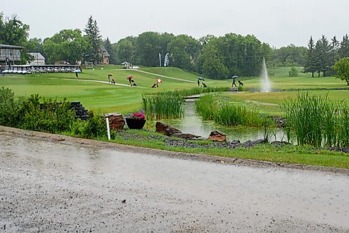 JESSE BOILY  / WINNIPEG FREE PRESS
Golfers prepare to head back out to play after a rain storm caused a pause in play at the Golf Manitobas Mens and Womens Junior Championship at the Selkirk Golf and Country Club on Monday. Monday, July 13, 2020.
Reporter: Mike Sawatzky