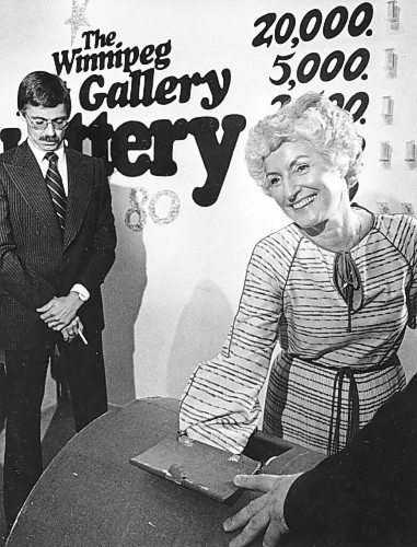 Canstar Community News Norma Price draws winning names in a Winnipeg Art Gallery Lottery while auditor Bob Tollefson looks on in this undated photo from the Winnipeg Tribune photo collection held by the University of Manitoba Archives.