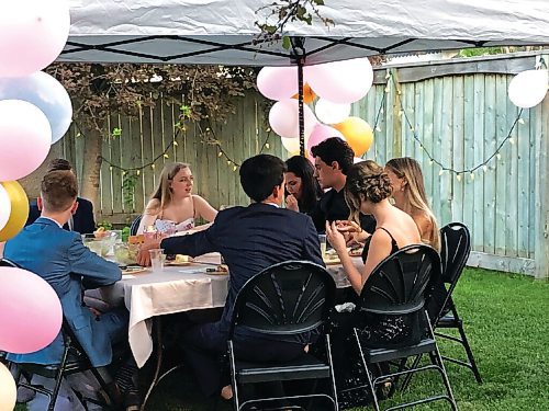 Canstar Community News The graduates ate dinner under a canopy in the Sierhuis family back yard, which had also been set up with a seating area, outdoor fireplace, a space for a photos and a reception area.