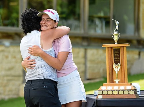 JESSE BOILY  / WINNIPEG FREE PRESS
Crystal Zamzow receives a bit hug from her mother at the Golf Manitobas Womens Junior Championship at the Selkirk Golf and Country Club on Tuesday. Zamzow won the Womens tournament. Tuesday, July 14, 2020.
Reporter: Mike Sawatzky