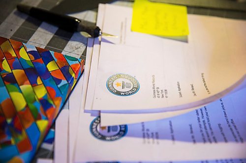 MIKAELA MACKENZIE / WINNIPEG FREE PRESS

JD Renaud flips through prank Duinness World Record prank letters, one of the five things that are getting him through this pandemic, in his home in Winnipeg on Wednesday, July 15, 2020. 
Winnipeg Free Press 2020.