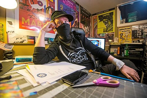 MIKAELA MACKENZIE / WINNIPEG FREE PRESS

JD Renaud poses for a portrait with some of the five things that are getting him through this pandemic (posters and canvases, random letters, and iPod touch) in his home in Winnipeg on Wednesday, July 15, 2020. 
Winnipeg Free Press 2020.