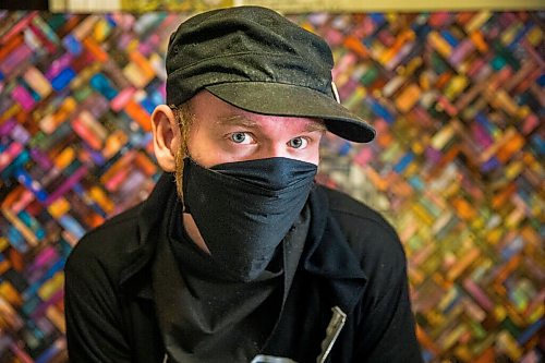 MIKAELA MACKENZIE / WINNIPEG FREE PRESS

JD Renaud poses for a portrait with some of the five things (Hubble space collage) that are getting him through this pandemic in his home in Winnipeg on Wednesday, July 15, 2020. 
Winnipeg Free Press 2020.