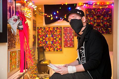 MIKAELA MACKENZIE / WINNIPEG FREE PRESS
JD Renaud poses for a portrait with some of the five things that are getting him through this pandemic (collages, office supply masks and cards) in his home in Winnipeg on Wednesday, July 15, 2020.
Winnipeg Free Press 2020.