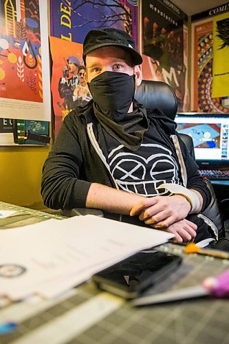 MIKAELA MACKENZIE / WINNIPEG FREE PRESS

JD Renaud poses for a portrait with some of the five things that are getting him through this pandemic (posters and canvases, random letters, and iPod touch) in his home in Winnipeg on Wednesday, July 15, 2020. 
Winnipeg Free Press 2020.