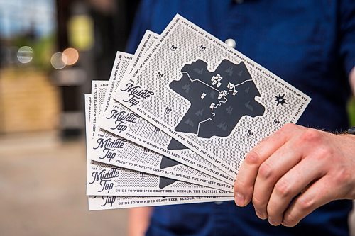 MIKAELA MACKENZIE / WINNIPEG FREE PRESS

Rob Stansel, who has started an online beer venture called Middle Tap, poses for a portrait with a map of local breweries at Barn Hammer Brewing Company in Winnipeg on Wednesday, July 15, 2020. For Ben Sigurdson story.
Winnipeg Free Press 2020.