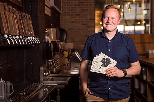 MIKAELA MACKENZIE / WINNIPEG FREE PRESS

Rob Stansel, who has started an online beer venture called Middle Tap, poses for a portrait with a map of local breweries at Barn Hammer Brewing Company in Winnipeg on Wednesday, July 15, 2020. For Ben Sigurdson story.
Winnipeg Free Press 2020.