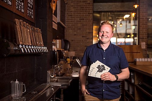 MIKAELA MACKENZIE / WINNIPEG FREE PRESS

Rob Stansel, who has started an online beer venture called Middle Tap, poses for a portrait with a map of local breweries at Barn Hammer Brewing Company in Winnipeg on Wednesday, July 15, 2020. For Ben Sigurdson story.
Winnipeg Free Press 2020.