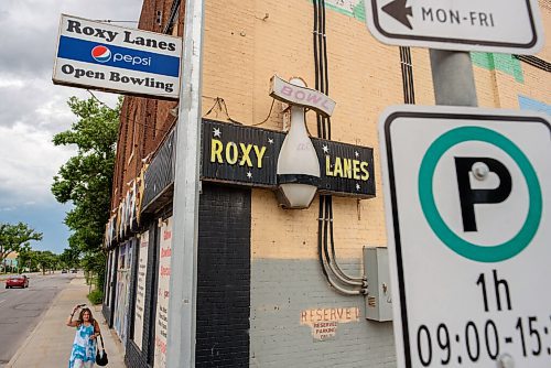 JESSE BOILY  / WINNIPEG FREE PRESS
Melissa Gauthier leaves the  Roxy Lanes bowling alley after her shift on Wednesday. The couple has owned the bowling alley for 11 years. The building being over 90 years old has become a museum of days past in the building that once was a theatre. The basement is full of artifacts from the past. Wednesday, July 15, 2020.
Reporter: Dave Sanderson